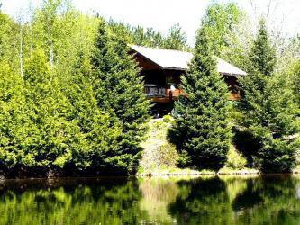 $339,900
Reduced Log Cabin in the woods with 100 acres,ponds,trails wildlfe..north of Ban