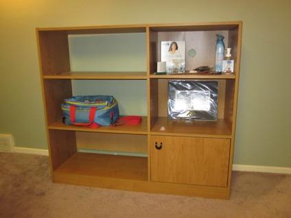 $35
Wood entertainment and shelving unit