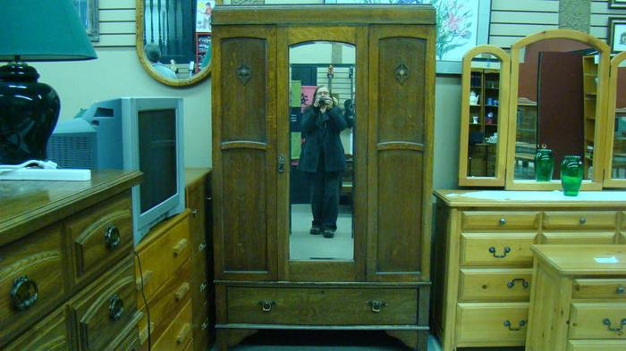 Antique Wardrobe with beveled glass mirror