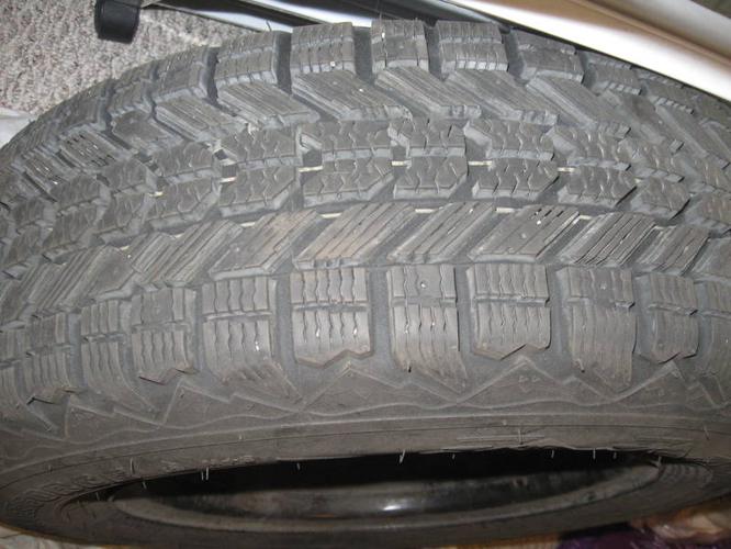 Two Brand New Firestone Snow Tires with Rims
