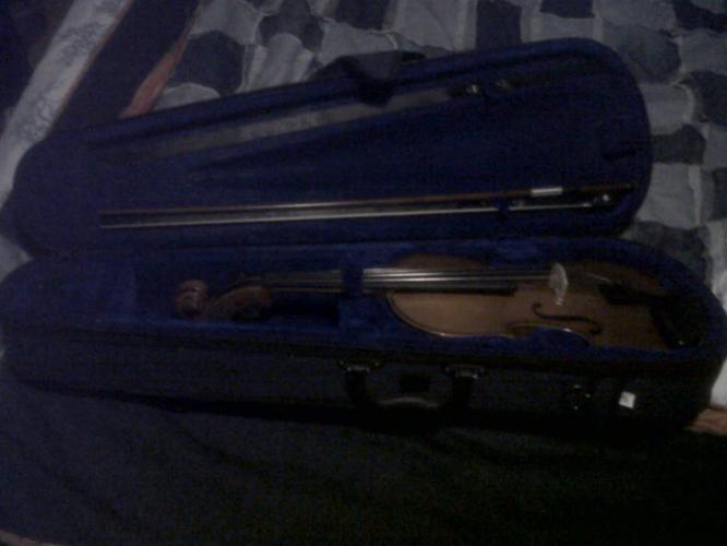 Violin, with bow, strap, and case full size.