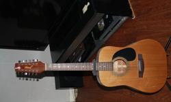 I am selling my Jasmine 12 string guitar. I am asking $200.00 firm. I will be undergoing amputation on my left hand in January, and I will no longer be able to play. If you are seriously interested in the guitar, please either call me at 613-933-9444 or
