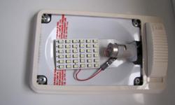 Bright low power L.E.D. Cool White or Warm White 36 led panel replaces existing 1156 or T10 921 bulb and uses 1.5 watts compared to 1141 bulb at 18 watts or 1156 bulbs at 27 watts.
Does not drain your battery as fast.
Or 18 Cool white low power L.E.D.