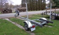 14' Boat trailer in excellent condition.  Suitable for aluminum boat.  New spare tire included.