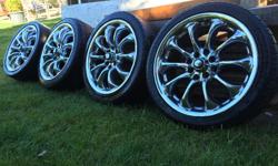 16" traxx Chrome rims. Good condition. Rubber needs replacing