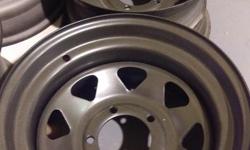 Set of 4. Just had them sandblasted and painted a Gunmetal Metalic Pearl. 16.5" x 8.25" Wheels. Bolt pattern is 5x5.5 or 5x139.7.
Came off of an 89 half ton Ford. Will fit other makes and models however, including Dodge. See link below for complete list.