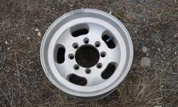 7 rims, 8 bolt, come with centre caps and lug nuts, one has 33" bfg AT tire. Call 250-318-0713