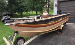 16.5 ft Sylvan Sea Monster complete with 50hp Mercury, Minn Kota foot pedal trolling motor, Eagle Ultra Plus fish finder, live well, leather seats, trailer with LED lights, spare prop, spare tire and cover.