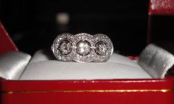 18K white gold diamond mill grain ring. 0.73 ct total diamond weight. 5.1g total ring weight. retail value of $2700. Asking $1499 with official appraisal