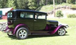 I have a 1928 2 door Chevrolet coach. Modified collector with plates. Has a 350 ram jet, Chevy hi-performance crate engine, R700-4 transmission with 2000 stall torque. Corvette swing axle rear-end, polished stainless steel front-end 4 wheel disc brakes.