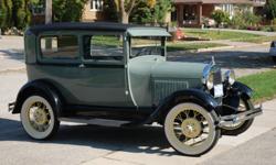 Fully restored 1929 Model A Ford Coupe. Engine needs work.