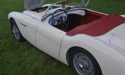 Up for sale is an Olde English White 1955 Austin Healey 100-4
This is a beautiful car, and is not just restored, but a gold concourse car. This car was taken down to Lake Tahoe to be judged, and ended up on the cover of the magazine.
Only 13093 miles
As
