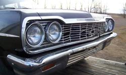 1964 Belair Station Wagon, 6 cyl , 3 speed manaul trans. Motor is not siezed, have not tried to get it to run. Black body with white roof.Car is complete,  has been sitting for many years, not running and has some rust . Body is not beat up, looks decent.