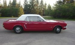 1965 Ford Mustang Coupe.  6 cylinder 3 speed standard. Restoration completed in 1995 (all receipts available).  Red exterior with white vinyl top and white interior.  Interior/undercarriage & powertrain rebuilt to factory standards. Appraised in 2008