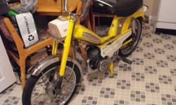 1970 Mobylette 50V moped. In decent original condition, only side panels and headlight have been repainted. Carburetor is rebuilt, New piston rings, all new engine gaskets, new belt. It does run, the only problem is the clutch is broken "the outer pads
