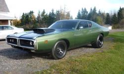 Must Sell 1971 Dodge Charger, 440 four barrel carb, automatic, tubbed with 16.5 wide rear tires and roll cage completely restored, needs for nothing, dont have time for it and have more money into it then we are selling it for , please serious inquiries