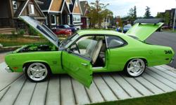 PRO/TOURING 1971 PLYMOUTH DUSTER 340.  2 year PROFESSIONAL ROTISSERIE RESTORATION.  Fully documented from start to finish.  APPRAISED VALUE $50,300.00  Show quality with laser straight panels and flawless throughout.  THIS CAR WOULD BE HARD TO BUILD FOR