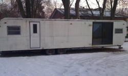 i have an old 1975 bonanza 32 foot travel trailer, in okay shape, no leaks, needs a good cleaning on the outside, could use some tlc, has living room, kitchen, bathroom and bedroom in the back, not like other trailers its like a small apartment haha,