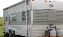 1975 20 foot Terry Travel Trailer, sleeps 6, great for first time owners or huners. separate washroom with shower, propane fridge, hotwater tank, oven, burners. Large awning along the entire side. complete with equalizer hitch. 2500 obo