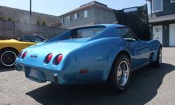 1976 Corvette T-Top.350/automatic.Local car with GM documentation.Power windows,tilt,leather,air,map light,rear defogger,power steering and brakes.
New tires,brakes,exhaust,shocks,paint,rugs.L-82 valve covers and extra chrome under the hood.
Needs air to