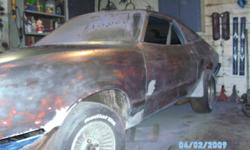this car is paint stippen down to metal so u can see that it needs minor work its a cobra mustang it has a ford 9" rearend as well it has a 302 ho sitting in it with 68 heads on it no finished yet and the interior is out but not a rust hole in this floor