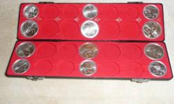 Boxed, Never Circulated 1976 Montreal Olympic Silver Coin Set Series I, IV, VII (6 $5.00, 6 $10.00) Coins still in plastic cases in plush leather box.