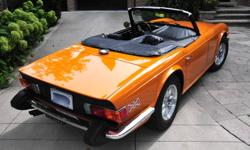 Last chance before she goes away, stunning award winning original paint, original interior, perfect condition "TIME CAPSULE" TR6 imported from Illinois and originated in California. This beautiful TOPAZ (rarest colour!) TR6 has been owned by one owner