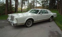 1977 LINCOLN CONTINENTAL MARK V.  93,000 kms. Very Good condition.  Features include leather seats, AM/FM, A/C, tinted glass, V8 engine, automatic transmission, power steering, power seats, power locks, power windows.  Kept in covered indoor storage for