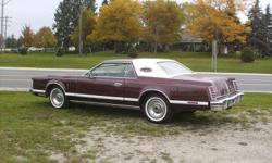 1977 Lincoln Mark V 460V8 auto,ps,pb,p.w,pl.tilt cruise am fm 8 track sunroof,reconditioned air condition blows ice cold vehicle is in nice condition with a beautiful interior.