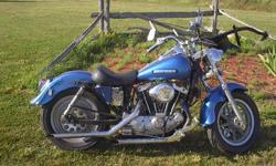 1981 Sportster 1000 ironhead with wide glide front end & fatbob tanks.Runs great, new updated electronic ingition. No more points.Nice wide rear tire & single or double seat.Just installed a new cycle world combination generator , regulator system.