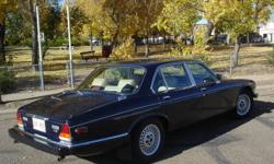Original 1988 Jaguar V12 Vanden Plas, Canadian edition.
Available on special order only, from Canadian Jaguar dealerships after 1987, and produced in very limited numbers through 1992... the definitive contemporary Jaguar luxury touring sedan.
 
I've had