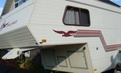 1989 23.5 Ft Travelmate 5th Wheel in excellent condition.  All appliances and mechanical in great condition.  Sleeps 6. Center Queen up top, Bench couch folds down for second bed, third bed with table conversion,  A/C, TV, Microwave, Oven.  Bathroom with