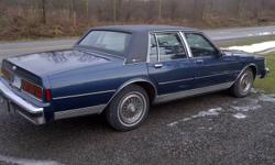 For Sale is my 1990 Chevy Caprice Classic Brougham. I am the second owner of the car. My neighbor is the original owner and bought this car brand new from the dealer. It was driven from new until 1999. He stored it for that winter with 121, 000km on it,
