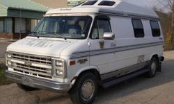 This is a Roadtrek Popular 190 Series RV based on a Chevrolet Van platform. A complete RV that comes with everything from a furnace, microwave, sink/washroom to a bed.
RoadTrek Popular 190 Recreation Vehicle
Chevrolet Van Features
8 Cylinder Engine
4
