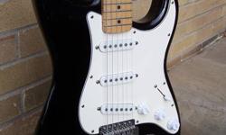 Here is a beautiful black 1993 Fender Standard Stratocaster (made in Mexico) with a maple neck. This is one of the earlier made in Mexico Fenders (production began there in 1990). An oldie but a goodie ... Has a set of brand new D'Addario strings. In