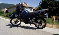 50 plus mile to the gallon, high-way pegs, hand guards, new battery, good tires, 3 quick release hard bags. Great bike!