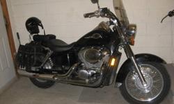 Honda Shadow, 17000 km's.  750cc, great riding bike and looks great. Lots of chrome, saddle bags, windsheild. 4500 or best offer. selling cert. Also willing to trade for car or suv or snowmachine