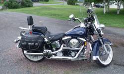 This is a 1999 Heritage Softail Classic in excellent condition.  Well maintained and cared for.  Very low mileage.  Good tires.  It is dressed up with lots of chrome.  This bike is a very comfortable ride.  It must be seen to be appreciated.  Serious
