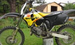 hi i have an rm 125 its 99' has fmf goldseries pipe, both tires still 75%, sprockets and chain are good,  this bike is a quicker 125 it beats my buddies 03 honda. i also have a spare jug, and chestprotector and boots to go with. email or txt 705-987-1062