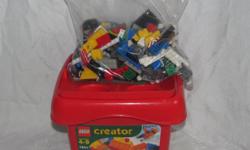Hello, we are selling a pound of Lego and a Lego storage bin. The bin originally came with a certain set of Lego; we don't have this exact configuration. We're selling the bin with 1 pound of basic bricks and wheels, not the Lego the bin shows on the
