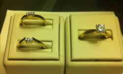Lady's 18kt. Yellow and white gold 4-prong solitaire engagement ring. Along with 2 18kt. Yellow gold diamond accent wedding/anniversary bands. Complete set has been professionally refurbished to brand new condition. Comes with a "Life Time Warranty" in