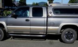 Make
Chevrolet
Colour
Silver/gray
Trans
Automatic
kms
154000
I bought the truck (2001 fully loaded Silverado 2500 4x4 short box 6 liter gas) from a good friend in 2011 with 95000 kms on it. It had the built in auxiliary 250L gas tank (cost $4000), truck