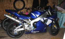 2001 yamaha R1, in excellent shape !!
 
*two brothers high mount exaust / also have stock exaust as well.
*flushmounts on the front and back.
*blue tinted front windseild with aftermarket spike bolt's.
*brand new spare front tire / both tires still have