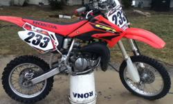 I have a Honda cr85r it is a good bike fun to ride it has been keep well mantained it is very clean and a great bike. It has new # plate graphics on it, renthal handle bars, and other then that thew bike is stock. bike comes with tech 10 boots and gear if