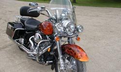 2004 Harley Road King upgraded to Screamin Eagle 1856 stroker in 2008
-True Fire paint, immaculate condition
-1856 stroker motor - 4.06" pistons- 251 cams- D & D Fat Cat pipes- 50mm throttle body - High flow A/C -output 112.12hp/121.4 torque - dyno tuned