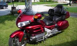 mint 2004 goldwing  , original owner ,  $2500 in extras make an offer or trade for tractor with backhoe or something interesting