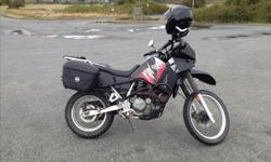 2004 Kawasaki KLR 650 ~43000km, comes with wrap around hand guards, Givi crash bars, Givi Hard side cases and top box, tank bag, cargo net and bungie's. New rear brake pads and fresh oil change. This bike will take you anywhere you want to go, sad to see