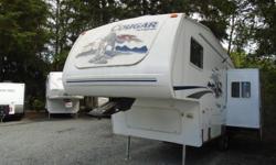 Well maintained rear entertainment Cougar 5th wheel. Clean and bright with loads of storage. Relax in the rocking chairs and eat at the booth style dinette that slides out to maximize interior space. The walk around queen bed gives you easy access and the