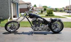 Black Chopper- Covington Cycle City Frame, Purse front end, 5 inch stretch Independant  5 Gal gas tank, HD engine and Tranny , 200 Rear tire, Avon Venom rubber, Ultimate Machine Chrome rims. BDL open Primary too many high end parts to list. BIKE is in
