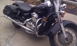 2005 Honda Shadow. 750cc. 19,148km's. Great bike in excellent shape. Has the leather saddle bags, currently has the solo seat installed but I have the regular seat as well. Comes with chaps, leather jacket, rain suit, helmet, large travel bag. Everything